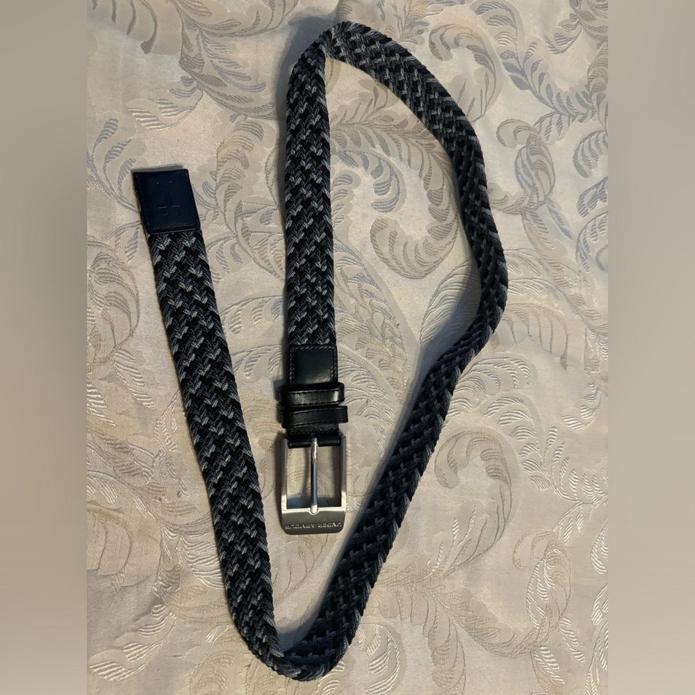 Under armor belt men’s measures 49 but stretches longer